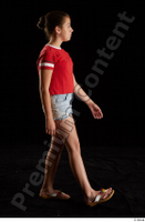  Ruby  1 dressed flip flop jeans shorts red t shirt side view walking whole body 0001.jpg